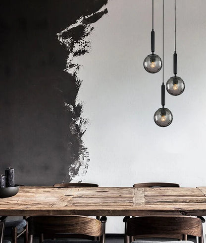 TRATTINO1X3R: Interior Smokey Black Spherical Glass Pendant Light
