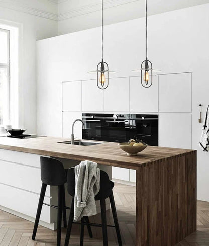 PAPILLON: Interior Oblong Iron with Glass Coolie Pendant Lights - Matte Black