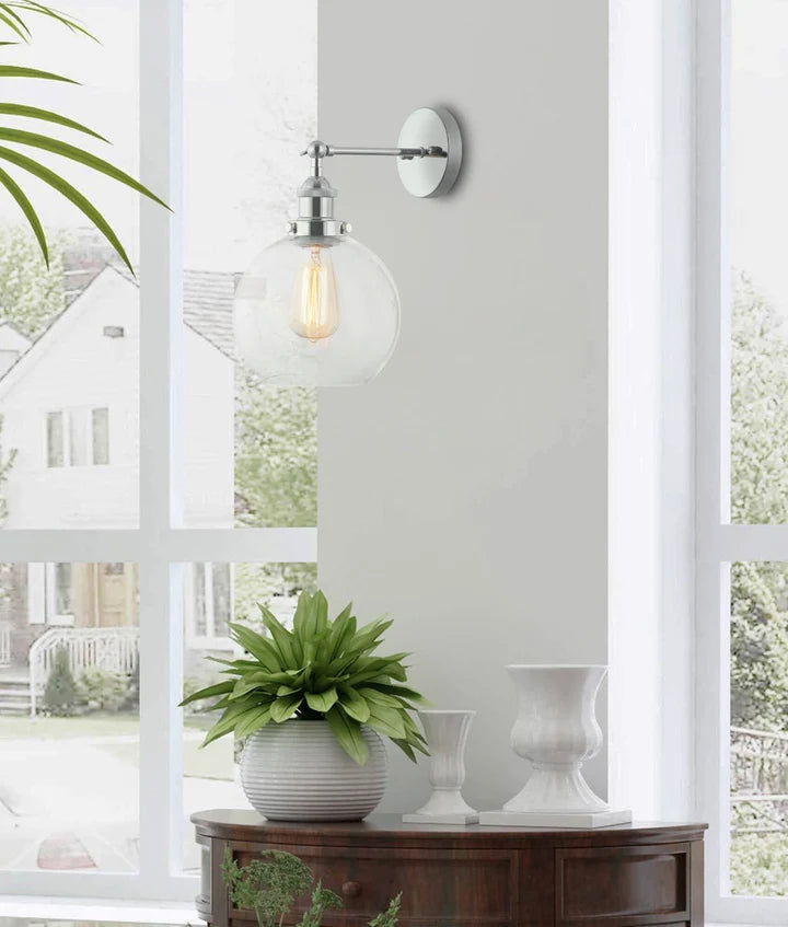PESINI: Interior Swing Arm Clear Glass with Chrome Highlight Wall Light