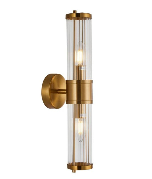 TIEMPO: Interior Up/Down Tubular Clear Glass Wall Light - Antique Brass